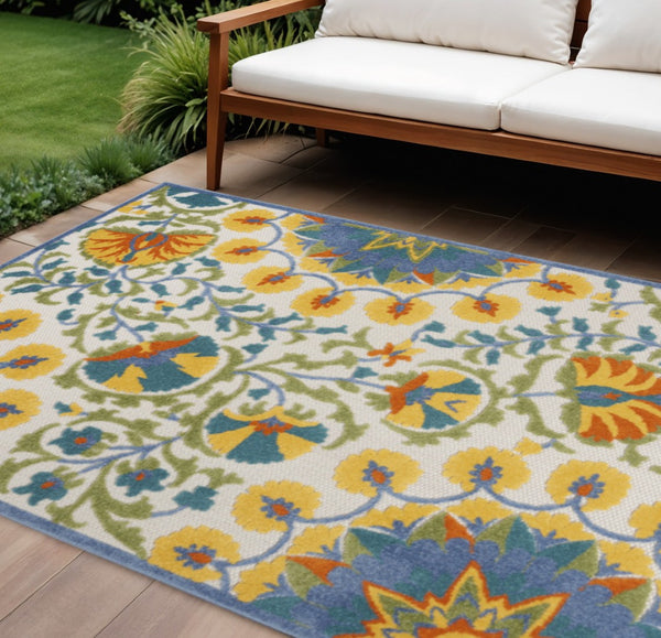 HomeRoots 5' Stylish Ivory and Blue Floral Area Rug - Durable Indoor/Outdoor Design for Elegant Spaces 6' x 9' 385063