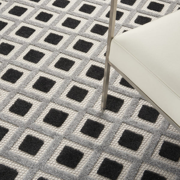 HomeRoots 5' Modern Geometric Area Rug - Durable Indoor/Outdoor Design for High-Traffic Spaces and Easy Care 6'x9' Area Rug Black White 385142
