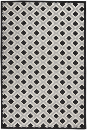 HomeRoots 5' Modern Geometric Area Rug - Durable Indoor/Outdoor Design for High-Traffic Spaces and Easy Care 6'x9' Area Rug Black White 385142