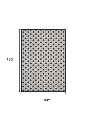 Homeroots 4' Black And White Indoor Outdoor Area Rug - Durable, Stylish, And Easy To Maintain For Any Space 8'x11' Area Rug Polypropylene 385145