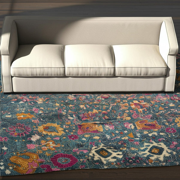 HomeRoots 5' Blue and Orange Floral Distressed Area Rug – Timeless Charm and Durability for Any Space! 5' x 7' 385176