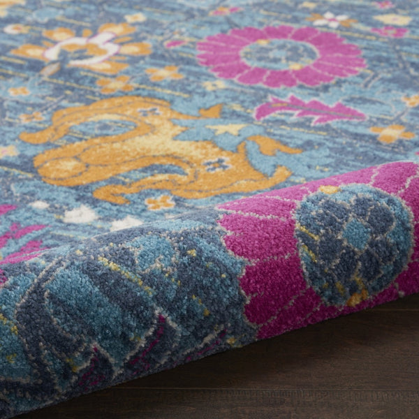 HomeRoots 5' Blue and Orange Floral Distressed Area Rug – Timeless Charm and Durability for Any Space! 5' x 7' 385176