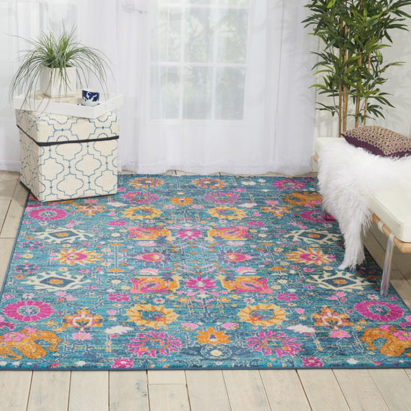 HomeRoots 5' Blue and Orange Floral Distressed Area Rug – Timeless Charm and Durability for Any Space! 5' x 7' 385176