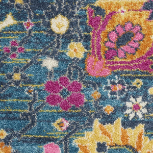 HomeRoots 5' Blue and Orange Floral Distressed Area Rug – Timeless Charm and Durability for Any Space! 5' Round 385177