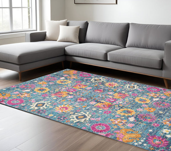 HomeRoots 5' Blue and Orange Floral Distressed Area Rug – Timeless Charm and Durability for Any Space! 7' x 10' 385179