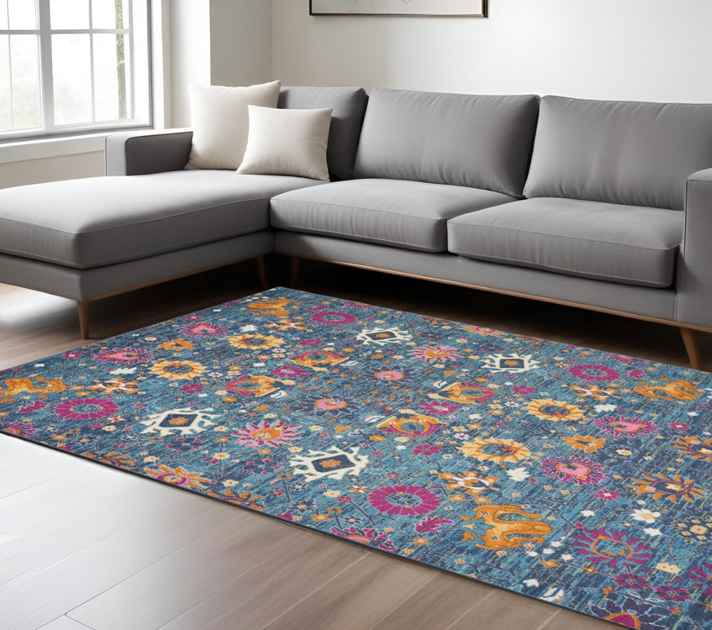 HomeRoots 5' Blue and Orange Floral Distressed Area Rug – Timeless Charm and Durability for Any Space! 8' x 10' 385182