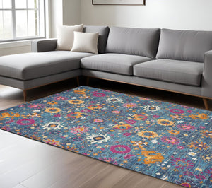 HomeRoots 5' Blue and Orange Floral Distressed Area Rug – Timeless Charm and Durability for Any Space! 8' x 10' 385182