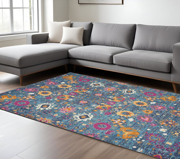 HomeRoots 5' Blue and Orange Floral Distressed Area Rug – Timeless Charm and Durability for Any Space! 8' x 10' 385182