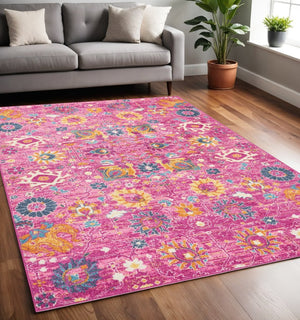 HomeRoots 5' Vibrant Fuchsia and Orange Floral Distressed Area Rug - Chic Design for Modern Home Elegance 5' x 7' 385193