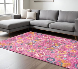 HomeRoots 5' Vibrant Fuchsia and Orange Floral Distressed Area Rug - Chic Design for Modern Home Elegance 7' x 10' 385198