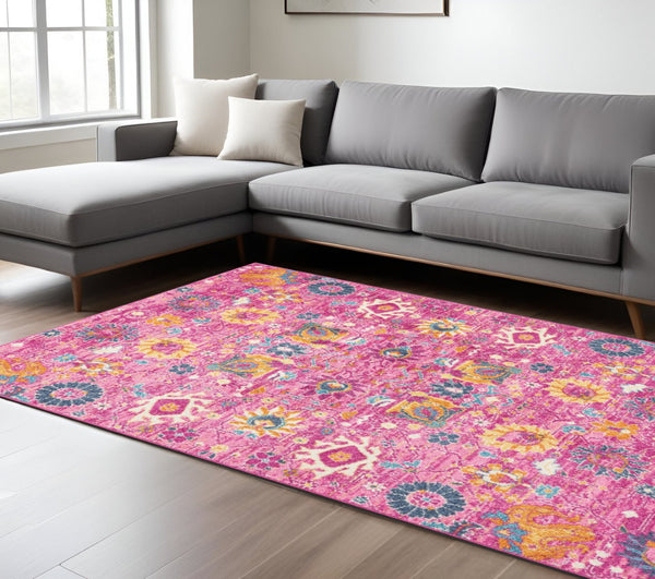 HomeRoots 5' Vibrant Fuchsia and Orange Floral Distressed Area Rug - Chic Design for Modern Home Elegance 7' x 10' 385198