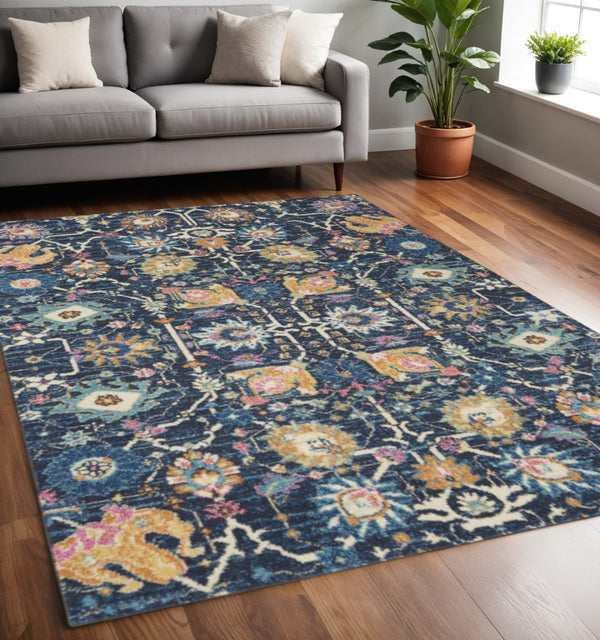 HomeRoots 5' Vibrant Navy Blue Floral Area Rug with Yellow and Pink Accents for Stylish Home Décor Appeal 5? x 7? 385229