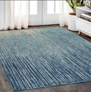 HomeRoots 5' Blue and Ivory Abstract Area Rug - Modern Design, Durable, Soft Pile for Any Room Decor Style 5' X 7' Rectangle 385284