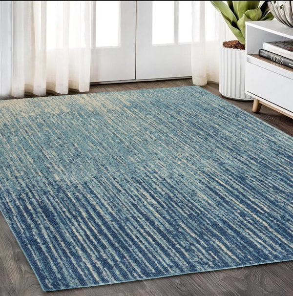 HomeRoots 5' Blue and Ivory Abstract Area Rug - Modern Design, Durable, Soft Pile for Any Room Decor Style 5' X 7' Rectangle 385284