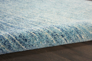 HomeRoots 5' Blue and Ivory Abstract Area Rug - Modern Design, Durable, Soft Pile for Any Room Decor Style 5' X 7' Rectangle 385284