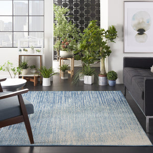 HomeRoots 5' Blue and Ivory Abstract Area Rug - Modern Design, Durable, Soft Pile for Any Room Decor Style 5' X 7' Rectangle 385284