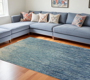 HomeRoots 5' Blue and Ivory Abstract Area Rug - Modern Design, Durable, Soft Pile for Any Room Decor Style 8' X 10' Rectangle 385287