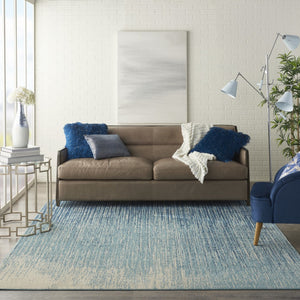 HomeRoots 5' Blue and Ivory Abstract Area Rug - Modern Design, Durable, Soft Pile for Any Room Decor Style 8' X 10' Rectangle 385287