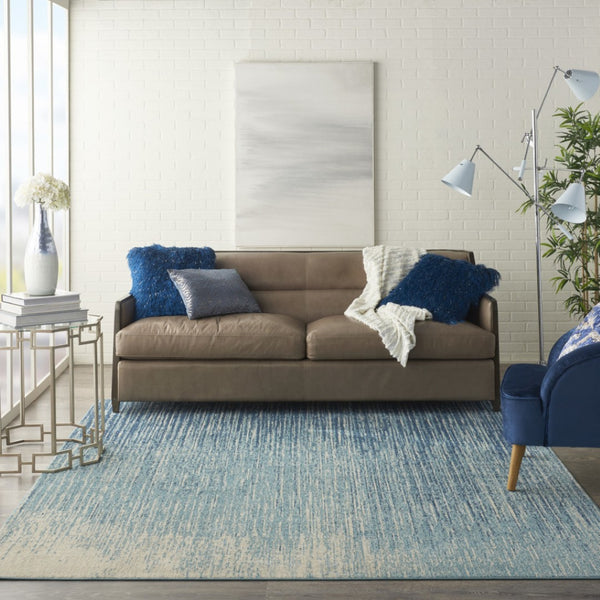 HomeRoots 5' Blue and Ivory Abstract Area Rug - Modern Design, Durable, Soft Pile for Any Room Decor Style 8' X 10' Rectangle 385287