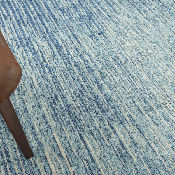 HomeRoots 5' Blue and Ivory Abstract Area Rug - Modern Design, Durable, Soft Pile for Any Room Decor Style 8' Round Round 385288