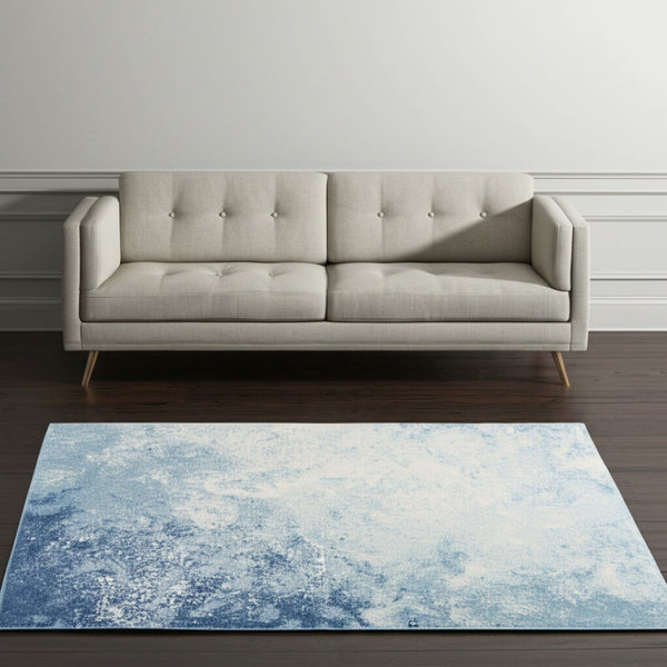 HomeRoots 5' Abstract Area Rug in Blue and Ivory - Modern Design for Stylish Living Rooms and Home Offices 5' X 7' Rectangle 385298