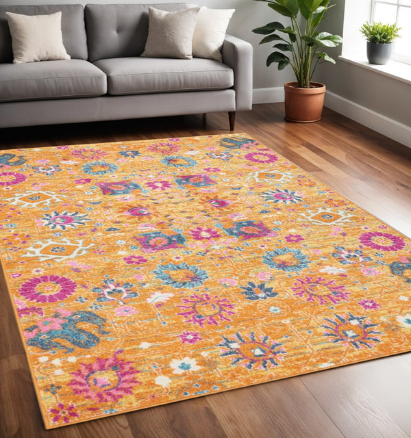 HomeRoots 5' Blue and Orange Floral Distressed Area Rug – Timeless Elegance for Modern and Traditional Spaces 5' X 7' Rectangle 385304