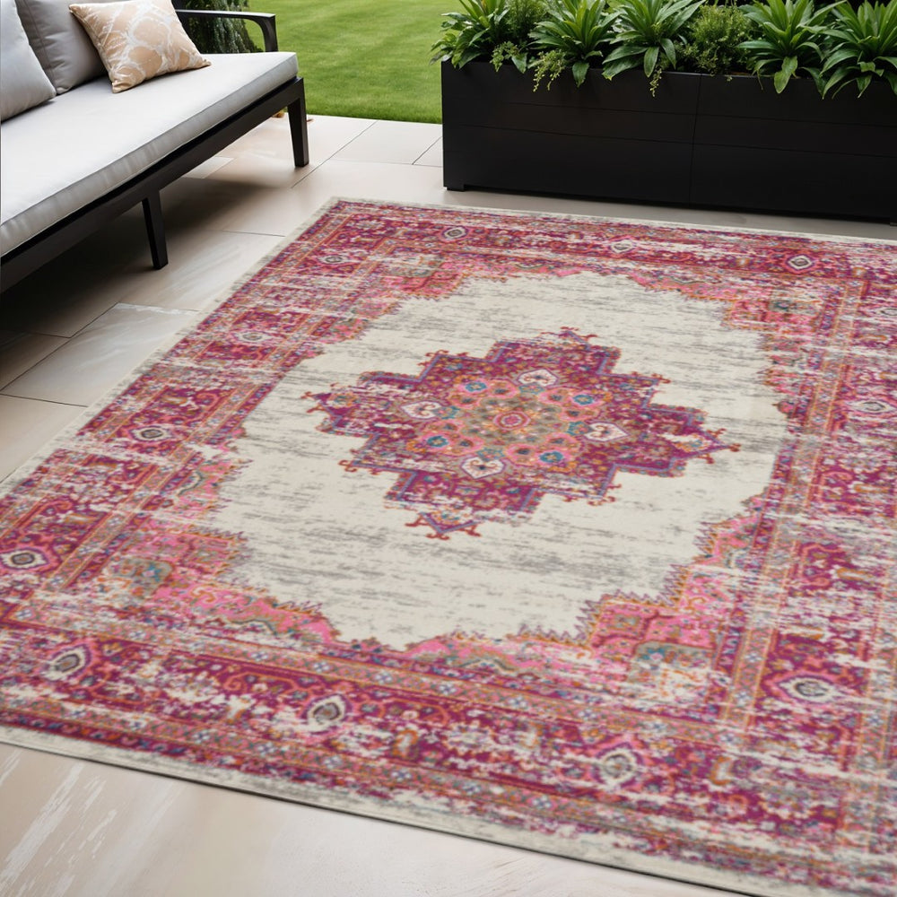 HomeRoots 5' Ivory and Fuchsia Oriental Distressed Area Rug - Vintage Charm for Modern and Classic Spaces 7' x 10' 385325
