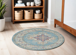 HomeRoots 5' Southwestern Distressed Area Rug in Blue and Ivory - Durable, Rustic Charm for Any Space 5' Round Round 385335