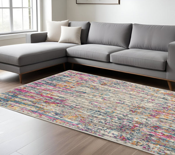 HomeRoots 5' Abstract Area Rug in Ivory and Blue - Modern Elegance for Living Rooms, Bedrooms & Offices 8' x 10' 385355