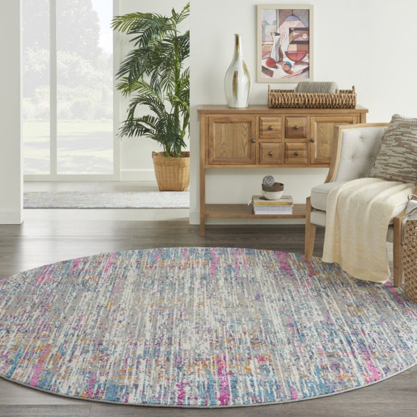 HomeRoots 5' Abstract Area Rug in Ivory and Blue - Modern Elegance for Living Rooms, Bedrooms & Offices 8' Round 385356