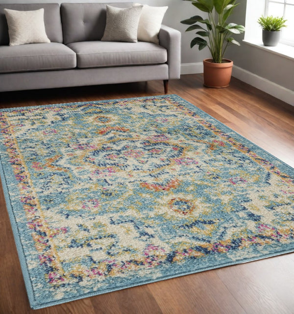 HomeRoots 5' Transform Your Space with This Elegant Ivory and Blue Distressed Oriental Area Rug for Any Room 5?x7? 385581