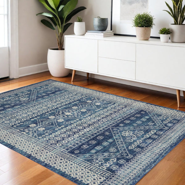 HomeRoots 5' Navy Blue and Ivory Tribal Area Rug - Stylish, Durable Floor Cover for Modern Living Spaces 5' x 7' 385605