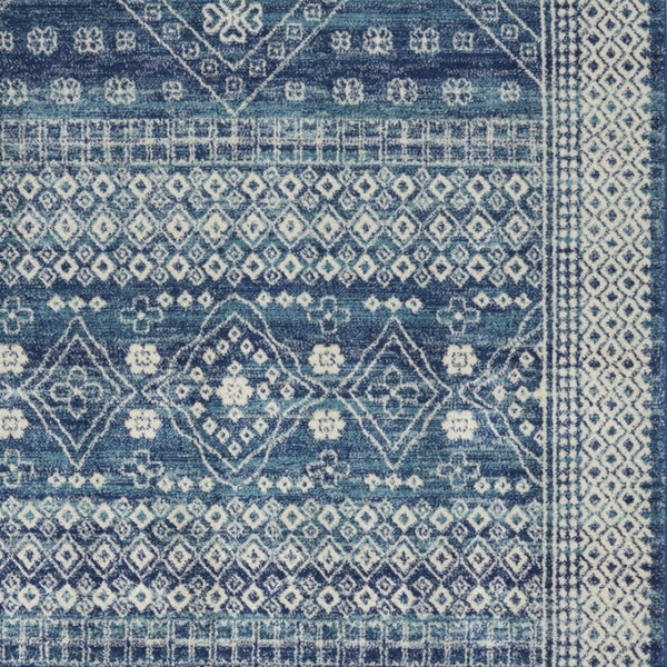 HomeRoots 5' Navy Blue and Ivory Tribal Area Rug - Stylish, Durable Floor Cover for Modern Living Spaces 5' x 7' 385605