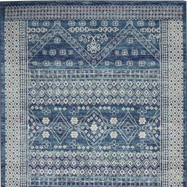 HomeRoots 5' Navy Blue and Ivory Tribal Area Rug - Stylish, Durable Floor Cover for Modern Living Spaces 5' x 7' 385605