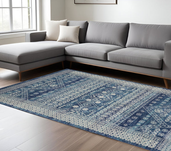 HomeRoots 5' Navy Blue and Ivory Tribal Area Rug - Stylish, Durable Floor Cover for Modern Living Spaces 7' x 10' 385606
