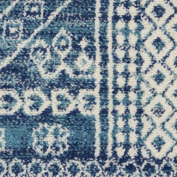 HomeRoots 5' Navy Blue and Ivory Tribal Area Rug - Stylish, Durable Floor Cover for Modern Living Spaces 8' x 10' 385607