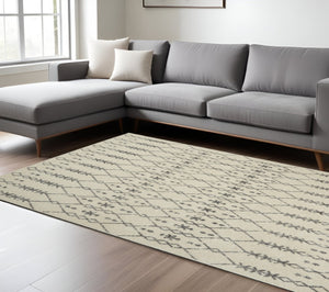 HomeRoots 8' Modern Gray and Ivory Geometric Distressed Area Rug for Living Rooms, Bedrooms, and Dining Spaces 8' x 10' 385756