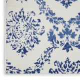 Homeroots 6' X 9' Blue And Ivory Floral Dhurrie Area Rug Ivory Navy Polypropylene 385824