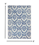 Homeroots 6' X 9' Blue And Ivory Floral Dhurrie Area Rug Ivory Navy Polypropylene 385824