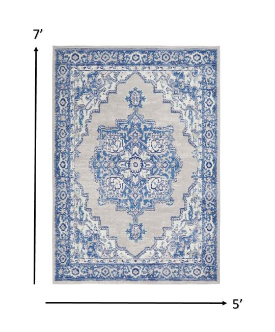 Homeroots 5' X 7' Blue Gray Floral Dhurrie Area Rug Grey Blue Polypropylene 385833