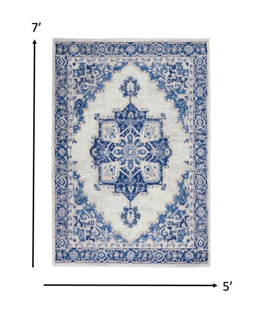 Homeroots 5' X 7' Blue And Ivory Floral Dhurrie Area Rug Ivory Blue Polypropylene 385836