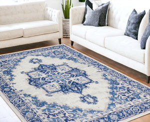 Homeroots 5' X 7' Blue And Ivory Floral Dhurrie Area Rug Ivory Blue Polypropylene 385836