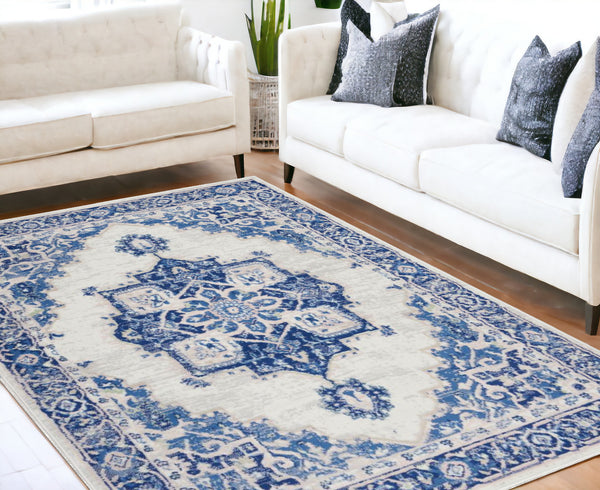 Homeroots 5' X 7' Blue And Ivory Floral Dhurrie Area Rug Ivory Blue Polypropylene 385836