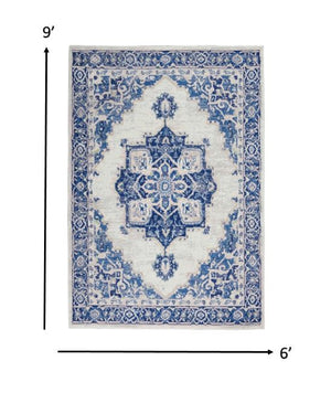 Homeroots 6' X 9' Blue And Ivory Floral Dhurrie Area Rug Ivory Blue Polypropylene 385837