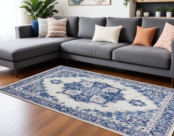 Homeroots 6' X 9' Blue And Ivory Floral Dhurrie Area Rug Ivory Blue Polypropylene 385837