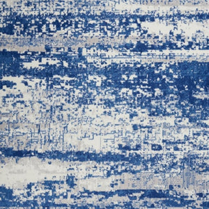 HomeRoots 6' Ivory and Blue Ombre Distressed Area Rug - Contemporary Design for Warmth and Style in Any Room 6' X 9' 385852