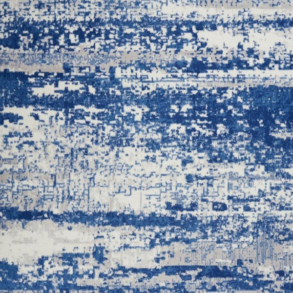 HomeRoots 6' Ivory and Blue Ombre Distressed Area Rug - Contemporary Design for Warmth and Style in Any Room 6' X 9' 385852