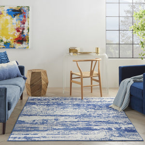 HomeRoots 6' Ivory and Blue Ombre Distressed Area Rug - Contemporary Design for Warmth and Style in Any Room 6' X 9' 385852