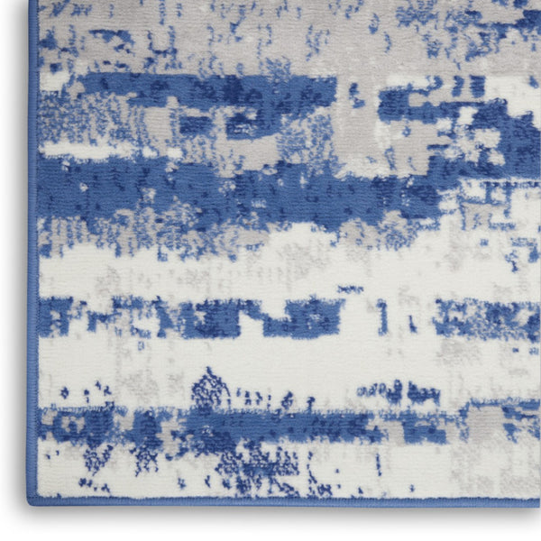 HomeRoots 6' Ivory and Blue Ombre Distressed Area Rug - Contemporary Design for Warmth and Style in Any Room 6' X 9' 385852