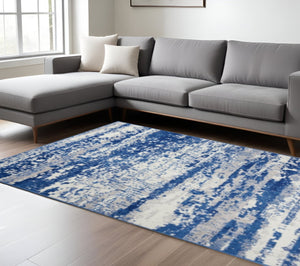 HomeRoots 6' Ivory and Blue Ombre Distressed Area Rug - Contemporary Design for Warmth and Style in Any Room 6' X 9' 385852
